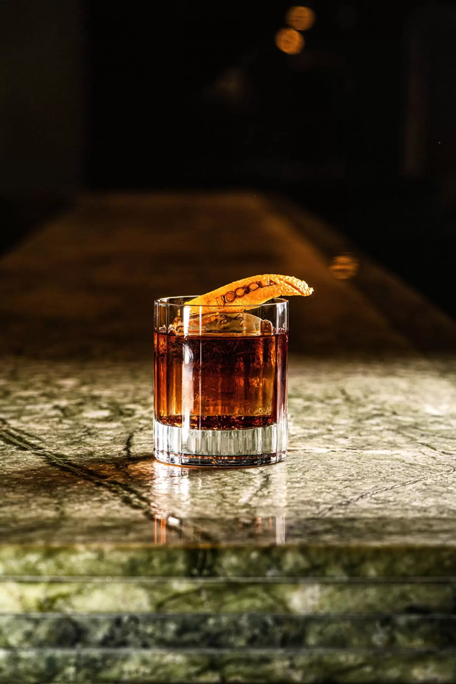 A Negroni on the bar at Lucciola, served with a orange peel