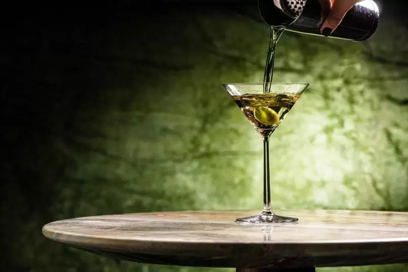A martini cocktail being poured in Lucciola
