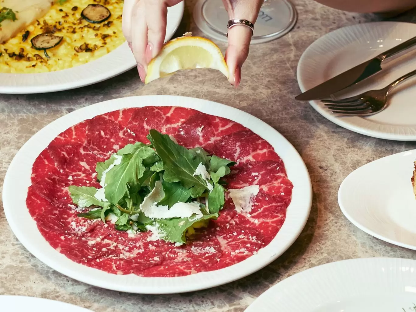 Lucciola_Wagyu Beef Carpaccio with Hari Sauce, Castelmagno and Arugula