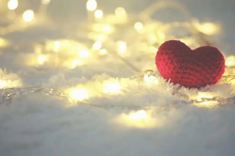 Red heart and Love Valentines day on white bokeh background.