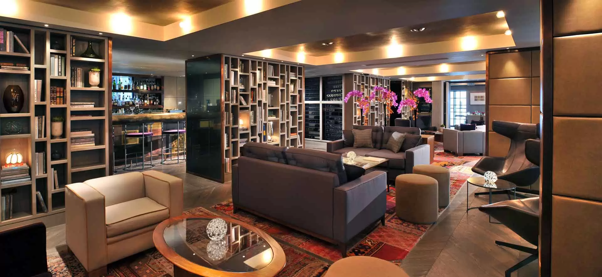 The Hari bar sofas and bookshelves