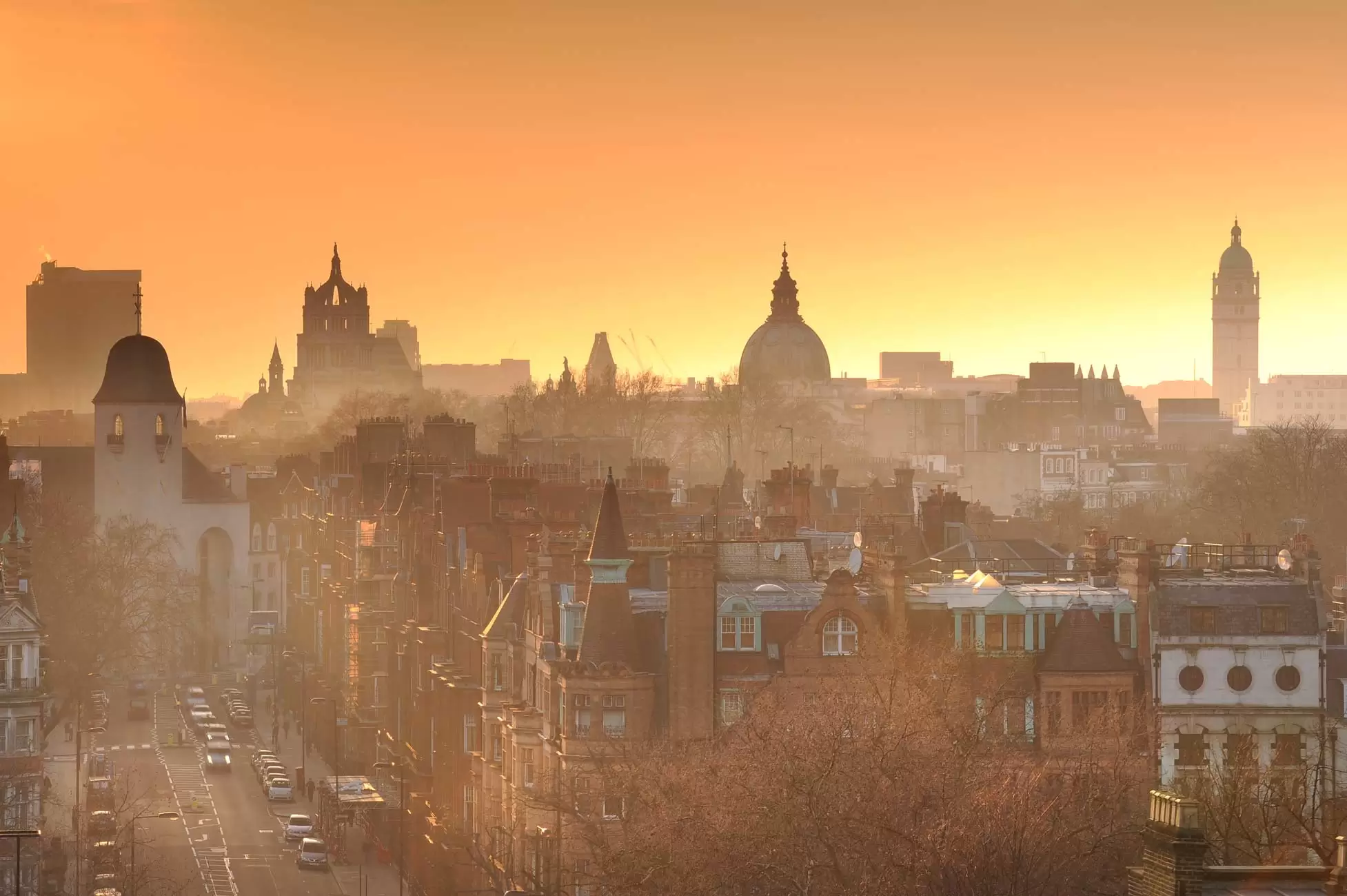 Hotel view and London city skyline at dusk